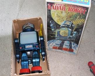 Radar Robot (to be tested) marked Japan. One end of the box is detached, but available.
Robot needs to be opened and have connections tested. One battery prong appears to be loose