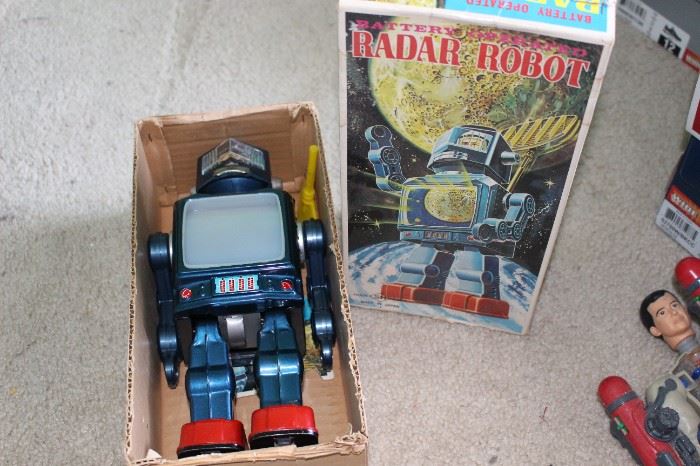 Radar Robot (to be tested) marked Japan. One end of the box is detached, but available.
Robot needs to be opened and have connections tested. One battery prong appears to be loose