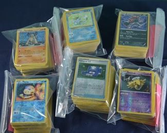 Pokemon Cards - Grouped into piles/bags of near 100 - Include more than 50 of character cards, remainder Energy and Trainer cards