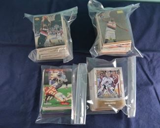2 bags of basketball, 1 football, 1 hockey