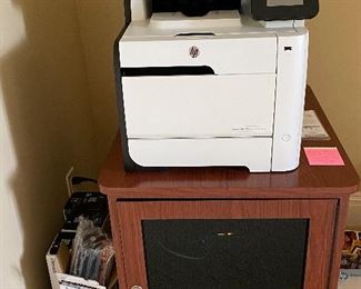 HP LaserJet copier with lock cabinet underneath