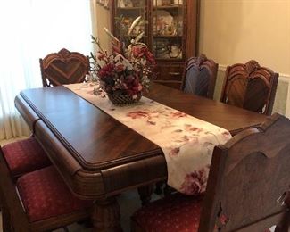 Notice the detail on the table.  There is a leaf stored within the table.