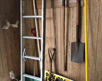 Extension ladder, shovels