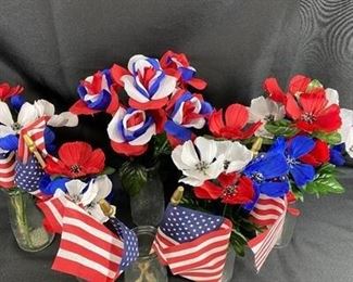 Red, White, and Blue Flowers in Milk Jug Bottle Vases