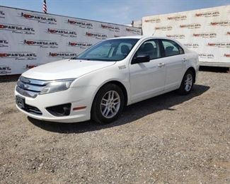 116: 2010 Ford Fusion
Year: 2010
Make: Ford
Model: Fusion
Vehicle Type: Passenger Car
Mileage: 68357
Plate:
Body Type: 4 Door Sedan
Trim Level: S
Drive Line: FWD
Engine Type: L4, 2.5L
Fuel Type: Gasoline
Horsepower:
Transmission:
VIN #: 3FAHP0GA9AR176517