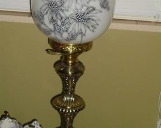 Brass table lamp w/white glass globe w/flowers