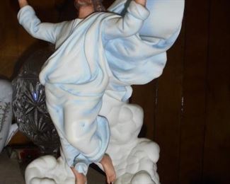 1 of2 matching figurines of Christ in the clouds