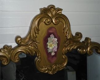 Ornate gold framed large mirror