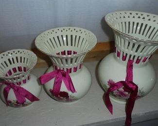 3 white flower arrangement  vases