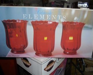 NIB  never used 3 classic red elements candle holders 