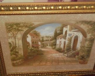 Framed & matted picture of arch way into old village