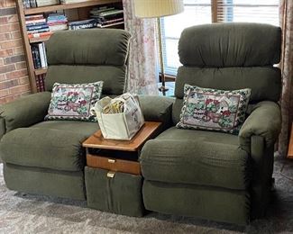 Double recliner with table and drawer attached