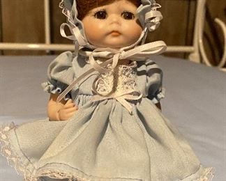 Madame Alexander doll with stand in original clothing