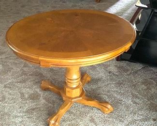 Round light oak side table
