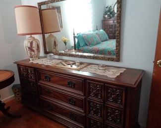 Vintage carved dresser and matching mirror