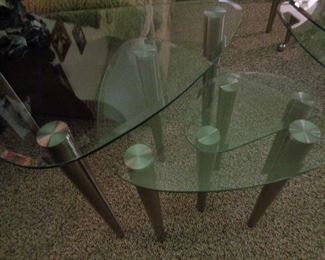 set of two glass and chrome nested tables