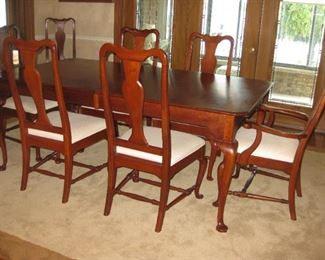 Cherry dining room table and chairs