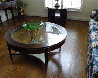 Circular glass top coffee table