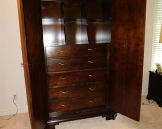 Terrible photo but it shows the drawers inside the armoire.