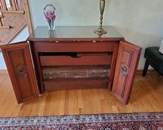 cabinet that has an extension table in it