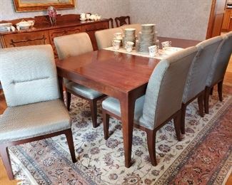 Beautiful Baker dining set with leaves, pads, 8 chairs covered in silk