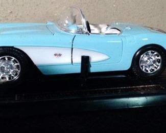Scale Model 1957 Light Blue Corvette Convertible  in Box, Doors open, trunk opens, hood opens 