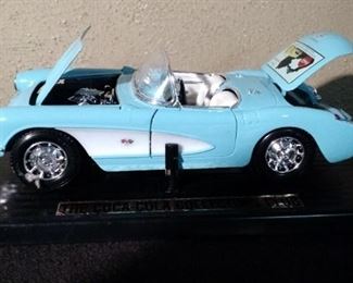 1957 corvette with doors, trunk and hood open