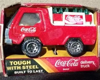 Many, and I do mean many, wonderful die cast trucks, cars, in assorted sizes and lasso rated styles at this sale. A must see to believe. The coke collector will be in heaven!