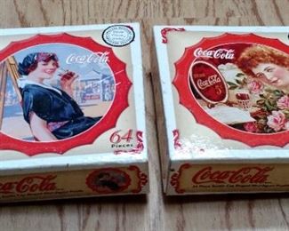 Two vintage Coca Cola 64 piece puzzles