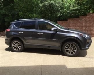 2018 TOYOTA RAVE4 LIMITED featuring a side view! 