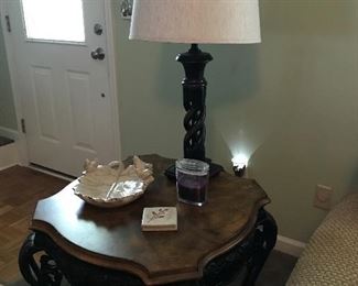 Ornate wood finish and iron heavyweight end table