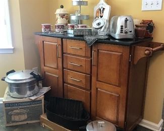 Kitchen Island with wheels, towel rack and plenty of storage!