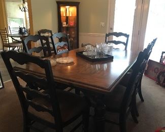 Rowley Creek, Ashley Furniture dining table and chairs...4 ladder back side chairs and 2 captions chairs