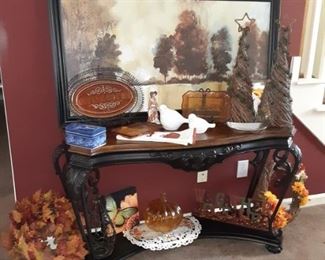 Ornate wood finish and iron heavyweight sofa table