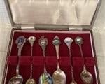 LOT OF ANTIQUE ENAMELED SOUVENOIR SPOONS

