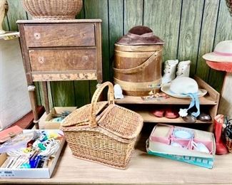 Wooden stand w/ 2 drawers (needs knobs) wooden handled shaker-style basket, woven picnic basket, child's dish set (NIB), vintage kid's shoes, hats, etc.