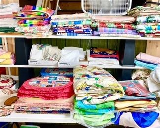 Vintage table linens, some plastic table clothes, etc.