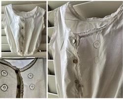 REDUCED!  $18.75 NOW, WAS $25.00....................Sleeveless blouse, #12
This kind of hand embroidery is called “Sfilato Siciliano”
All original (hand-made) mother pf pearl buttons.
