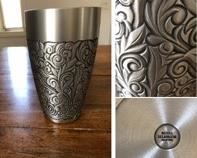 $25.00..................Pewter Vase From Royal Selangor Pewter 
Setapak, Salangor, Malaysia Max circumference is 4”, height is 8”
The weight is 1 Kg and 43 g