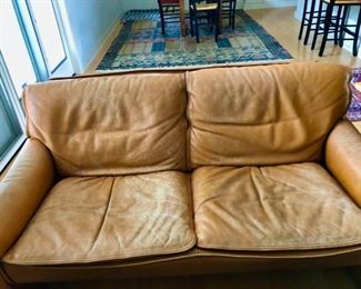 These were a gift from Grazia’s parents when their daughter Francesca was born in 1983
88”L x 37”W x 35”H
The leather is worn but still very soft and could probably improve by cleaning and moisturizing with an appropriate cream
The bottoms of two seats need to be repaired