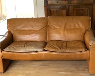 $50.00.................Pair of  Love Seat Leather Sofas.  These were a gift from Grazia’s parents when their daughter Francesca was born in 1983
88”L x 37”W x 35”H, The leather is worn but still very soft and could probably improve by cleaning and moisturizing with an appropriate cream
The bottoms of two seats need to be repaired