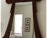 CLEARANCE !  $50.00 NOW, WAS $150.00................Large Unique Mirror, we bought this mirror in 1998 at the Apache Mall in Rochester from a store that sold furniture form a variety of different countries. This particular mirror was made in Thailand
Frame is made of wood (not sure what kind)
It has a sturdy foldable metal stand in the back and could be placed on the floor instead of hanging it as we have done. The shape of the mirror is irregular, approximate measures are 53.5”L x 58”H