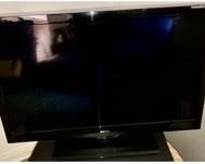 $50.00.....................39” Sanyo Rotating 2-tear TV, swivel stand included