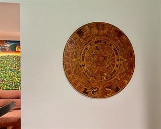 $150.00.................Wood Aztec Inlaid Calendar Cancun, Mexico, circa 1990 Purchased during a family trip to Cancun. 
Diameter is 33”, it is 1.5” thick