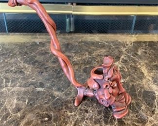 Red Mask and Snake Smoking Pipe