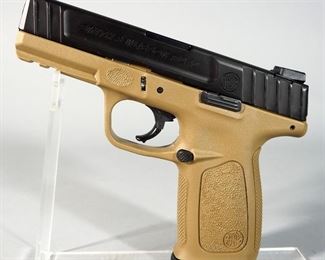 Smith & Wesson SD40 .40 S&W Pistol SN# FBH1038, 2 Total Mags, Mag Extender, And Paperwork, In Box