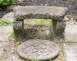 Concrete bench and decorative stone