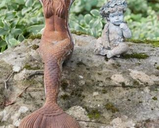 Metal mermaid yard art. Small figure on right made of resin