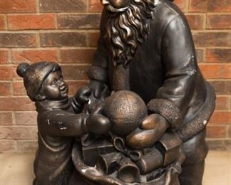 Vintage Santa and child yard art