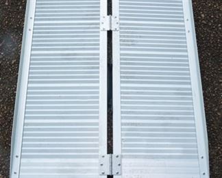 Folding wheelchair ramp